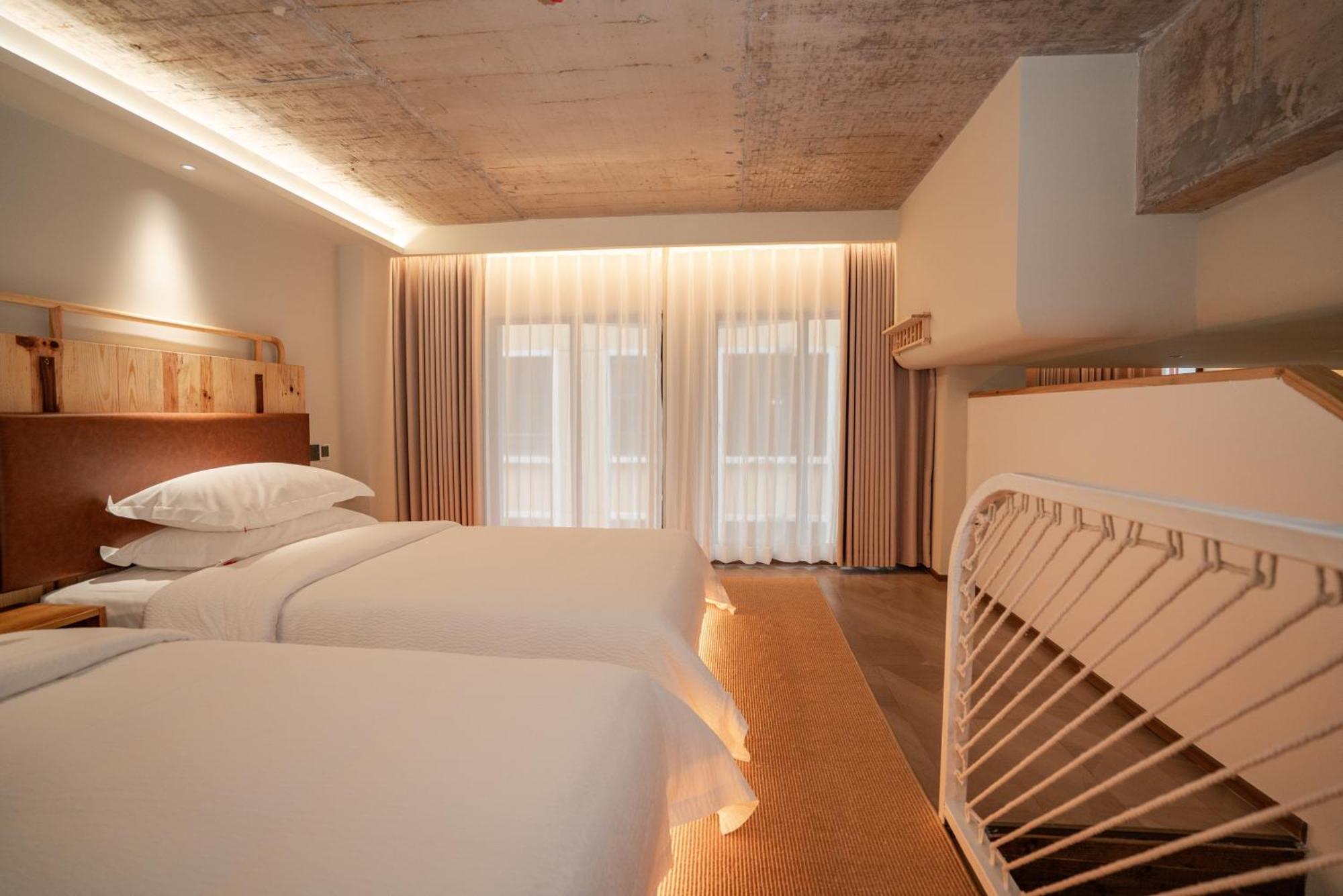 Patio Spring Holiday Inn -- Free Round Trip Pick-Up Service --Panoramic View Of Tianmen Mount Trương Gia Giới Phòng bức ảnh